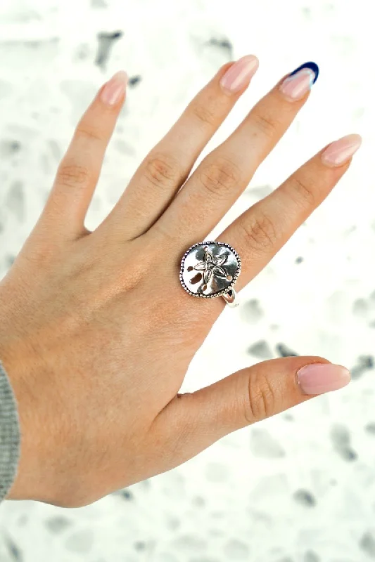 Rings with shield-shaped stones for boldness -SALE! Silvertone Dot Trimmed Sand Dollar Ring