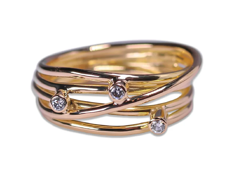 Rings with gothic-inspired skull motif details -Bezel Set Diamond Twist Ring