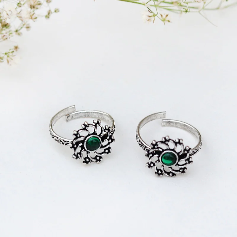 Rings with faceted garnet for deep shine -Teejh Dhrishya Green Stone Silver Oxidised Toe Rings