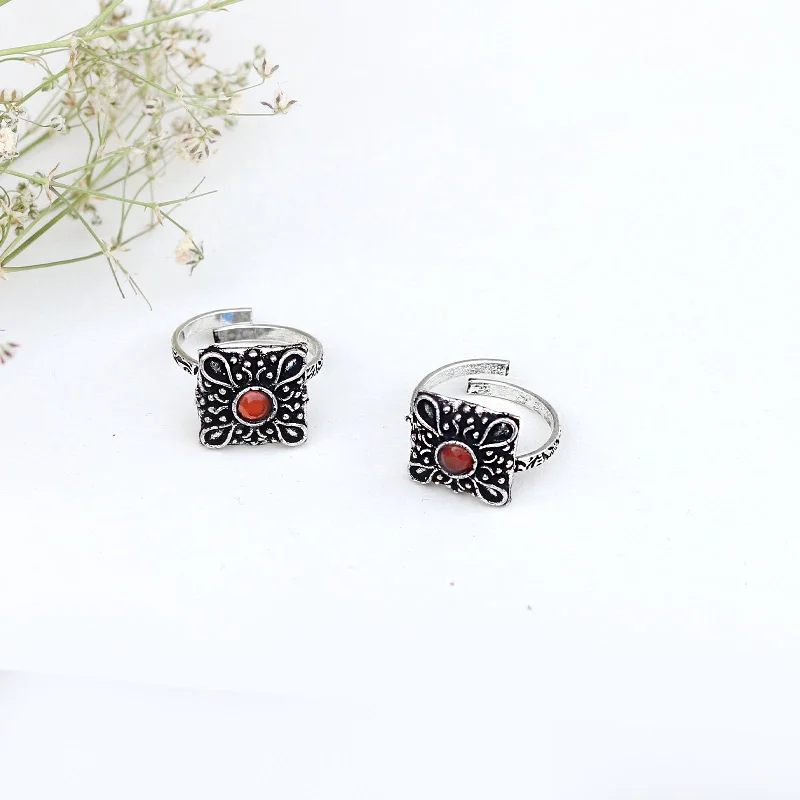 Rings with crescent moon for lunar charm -Teejh Uri Orange Stone Silver Oxidised Toe Rings