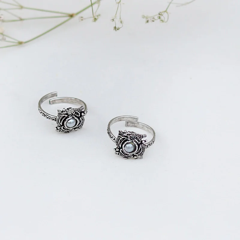 Rings with claw-set moonstone for mystique -Teejh Niya White Stone Silver Oxidised Toe Rings