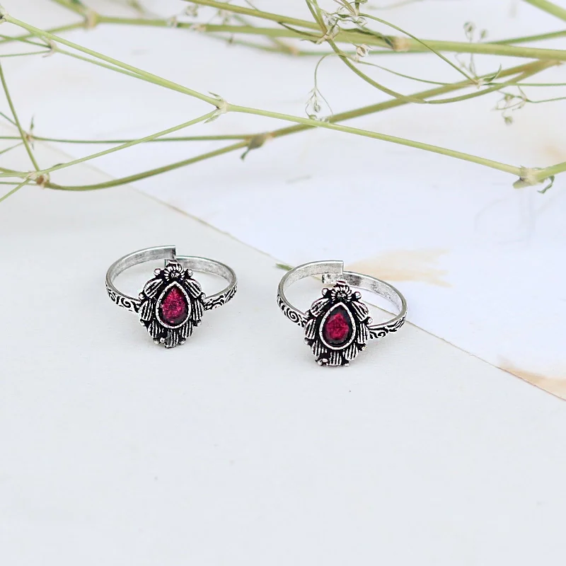 Rings with wide bands for statement wear -Teejh Pravya Pink Stone Silver Oxidised Toe Rings